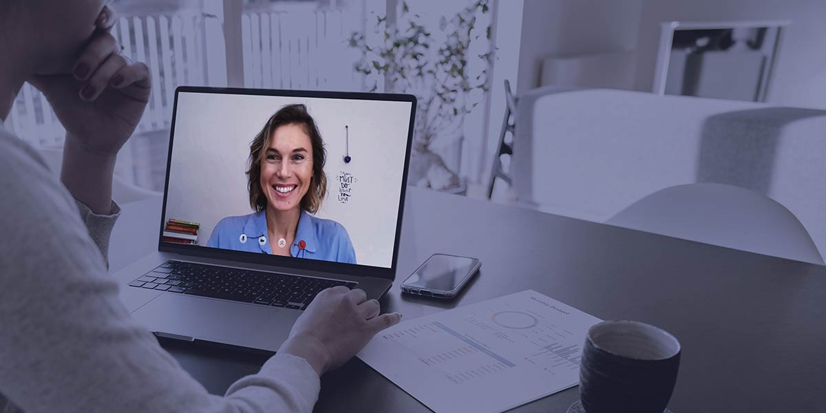 manager and employee meeting via video chat