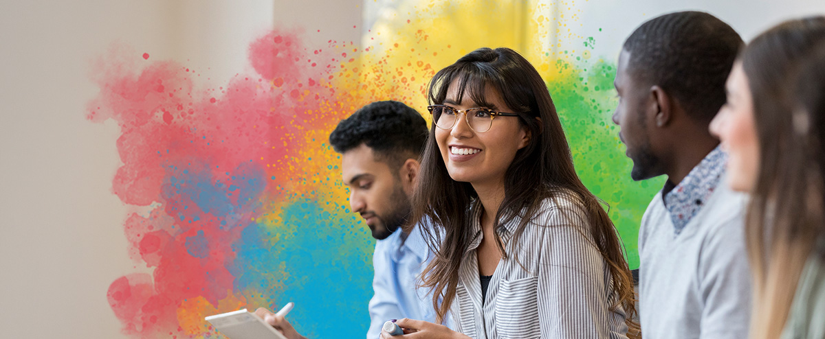 Employees at an onboarding event, showing how better onboarding can boost employee retention