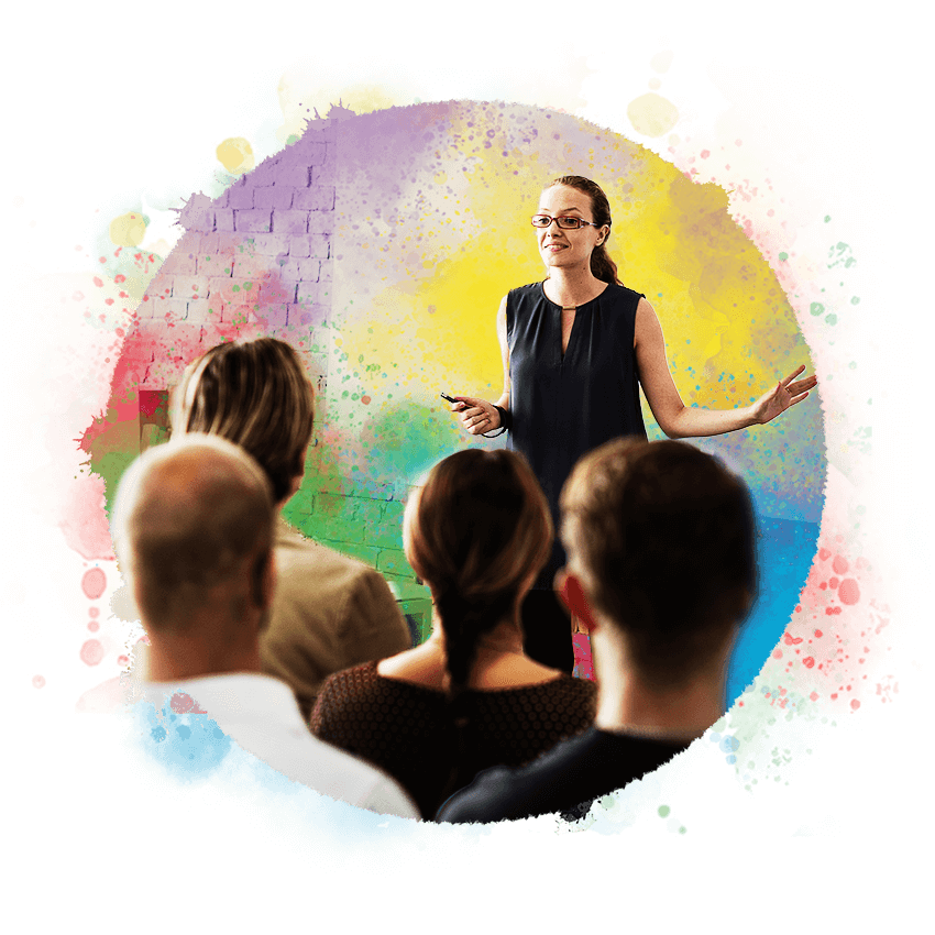 DiSC practitioner leading an in-person training session for a group