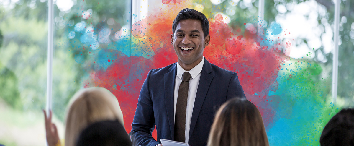 An i-style facilitator leading a DiSC training, showing enthusiasm and energy