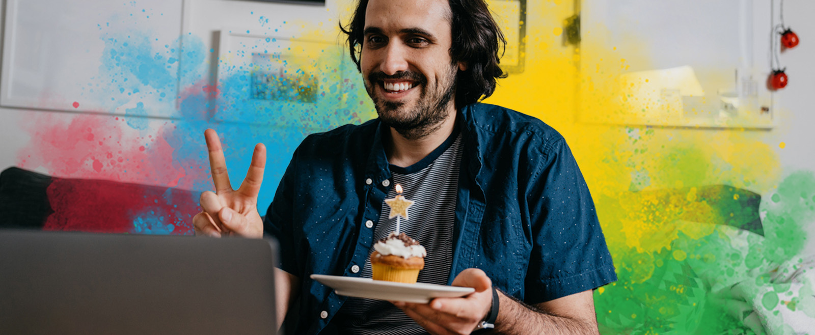 Workplace culture on remote team, man celebrating birthday with remote coworkers