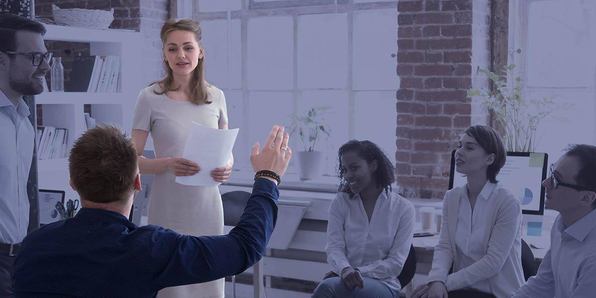 woman answering a group member's question